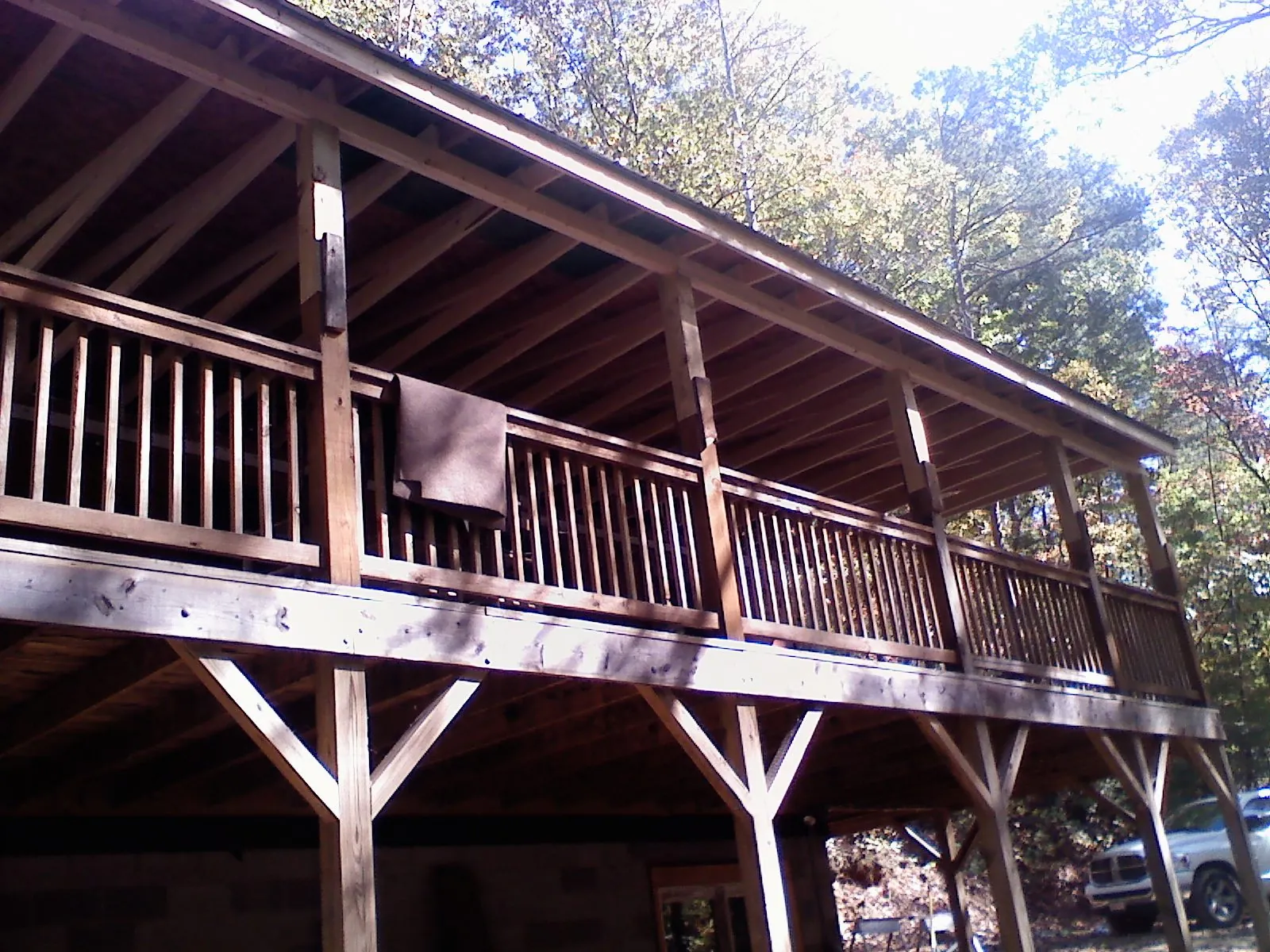 Timber framing under a new elevated porch and deck — Roof Leak Repair in Alton Bay by Roofing Brothers